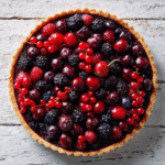 Dracula’s Blood Berry Tart with vibrant berry filling in golden crust