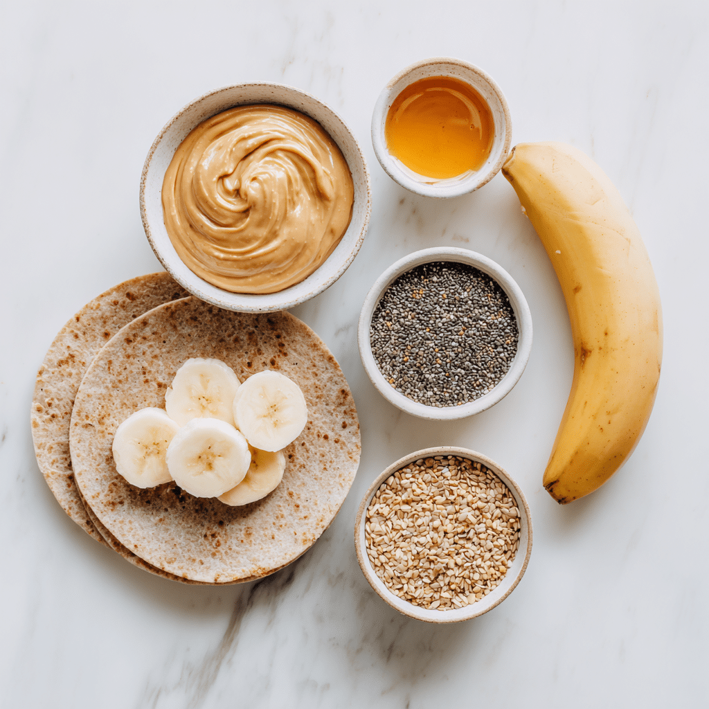 Ingredients for gluten free banana almond butter wraps laid out flat