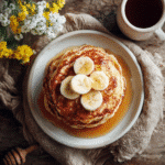 Banana cottage cheese pancakes gluten free on rustic table