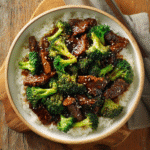 Simple Beef and Broccoli Gluten-Free served over rice in a white bowl
