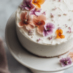 Finished Classic Gluten-Free Vanilla Cake on cake stand