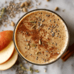 Apple Cinnamon Smoothie for Weight Loss in a glass on white marble
