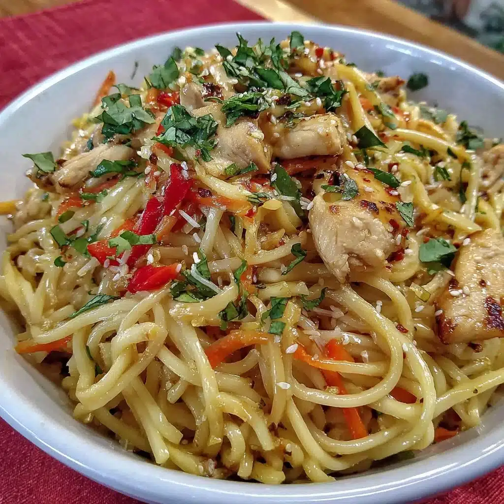 Delicious Gluten-Free Chicken Lo Mein served in a bowl with colorful vegetables