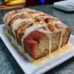 Gluten-free cinnamon swirl banana bread cooling on a wire rack