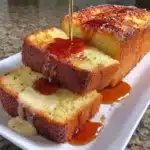Gluten Free French Butter Cake slice on a plate with a fork