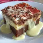 Delicious gluten free tiramisu brownies topped with cocoa powder