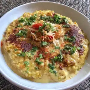 Healthy Oats Khichdi dish served in a bowl with vegetables