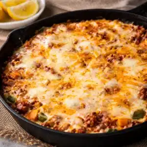 Delicious gluten free ground beef dinner skillet with colorful vegetables and spices