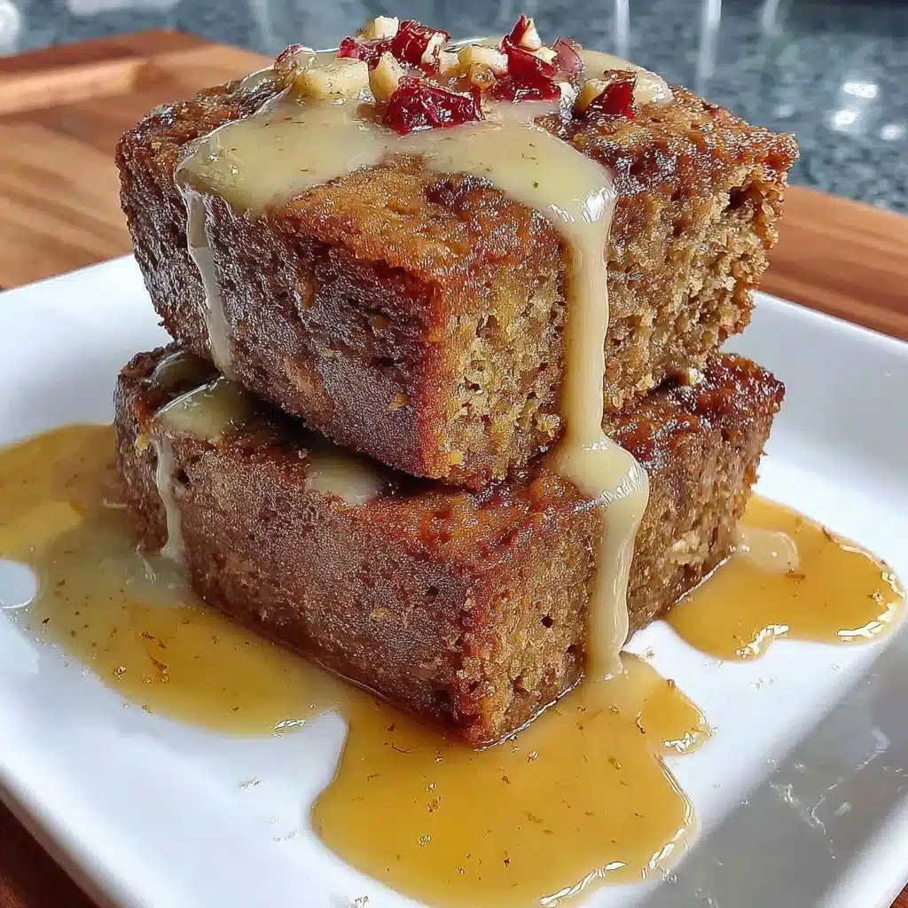 Slice of moist Vegan Applesauce Cake on a plate, decorated with fresh apples.