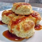 Gluten-free air fryer biscuits freshly baked and served on a plate