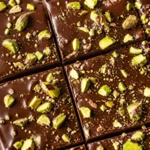 Delicious gluten free Dubai chocolate brownies with pistachio butter topping.