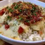 Delicious Coconut Chicken Rice Bowl with creamy coconut sauce and chicken