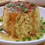 Delicious Garlic Butter Quinoa served in a bowl with fresh herbs.