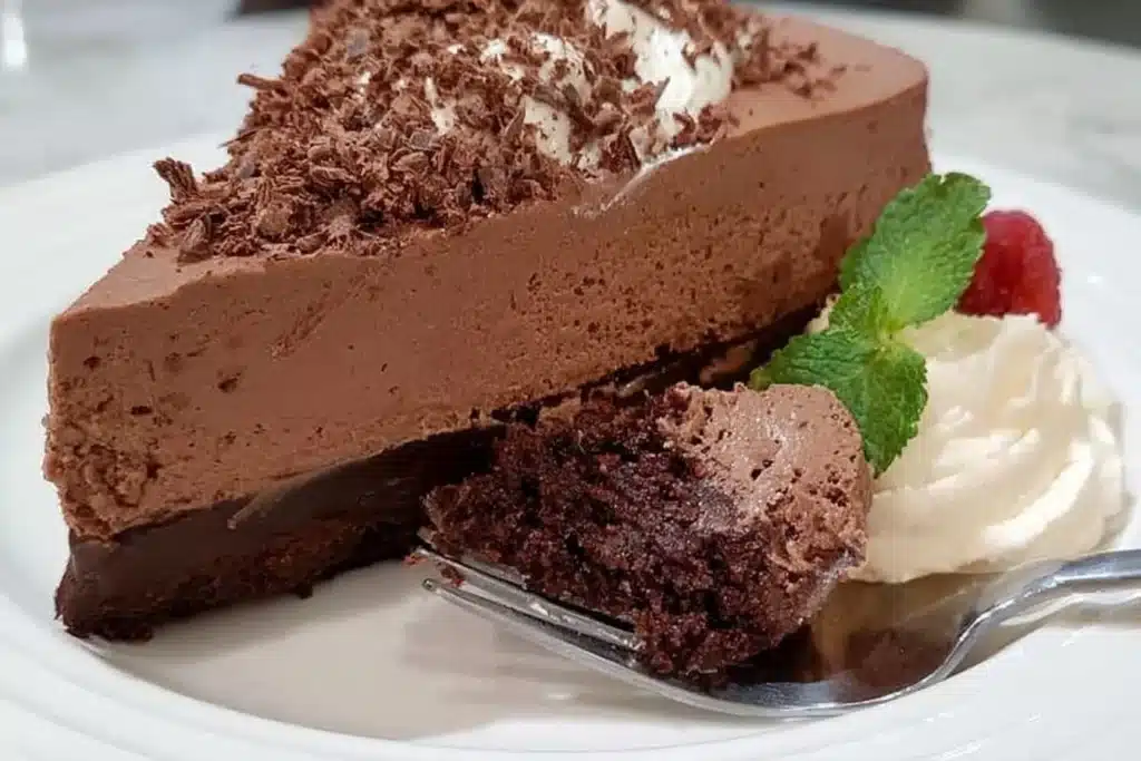 Gluten Free Chocolate Mousse Cake topped with fresh berries