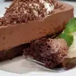 Gluten Free Chocolate Mousse Cake topped with fresh berries