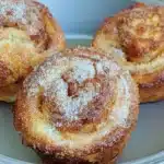 Gluten-free cinnamon sugar cruffins, a delicious pastry treat topped with cinnamon sugar.