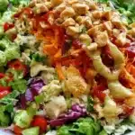 Delicious Asian Chicken Crunch Salad with vegetables and crunchy toppings