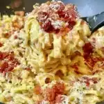 Creamy cabbage carbonara dish served in a bowl, perfect for dinner.