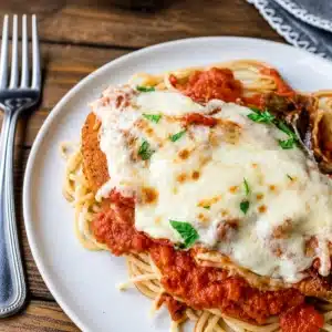 Crispy gluten-free chicken parmesan bake topped with marinara and mozzarella.