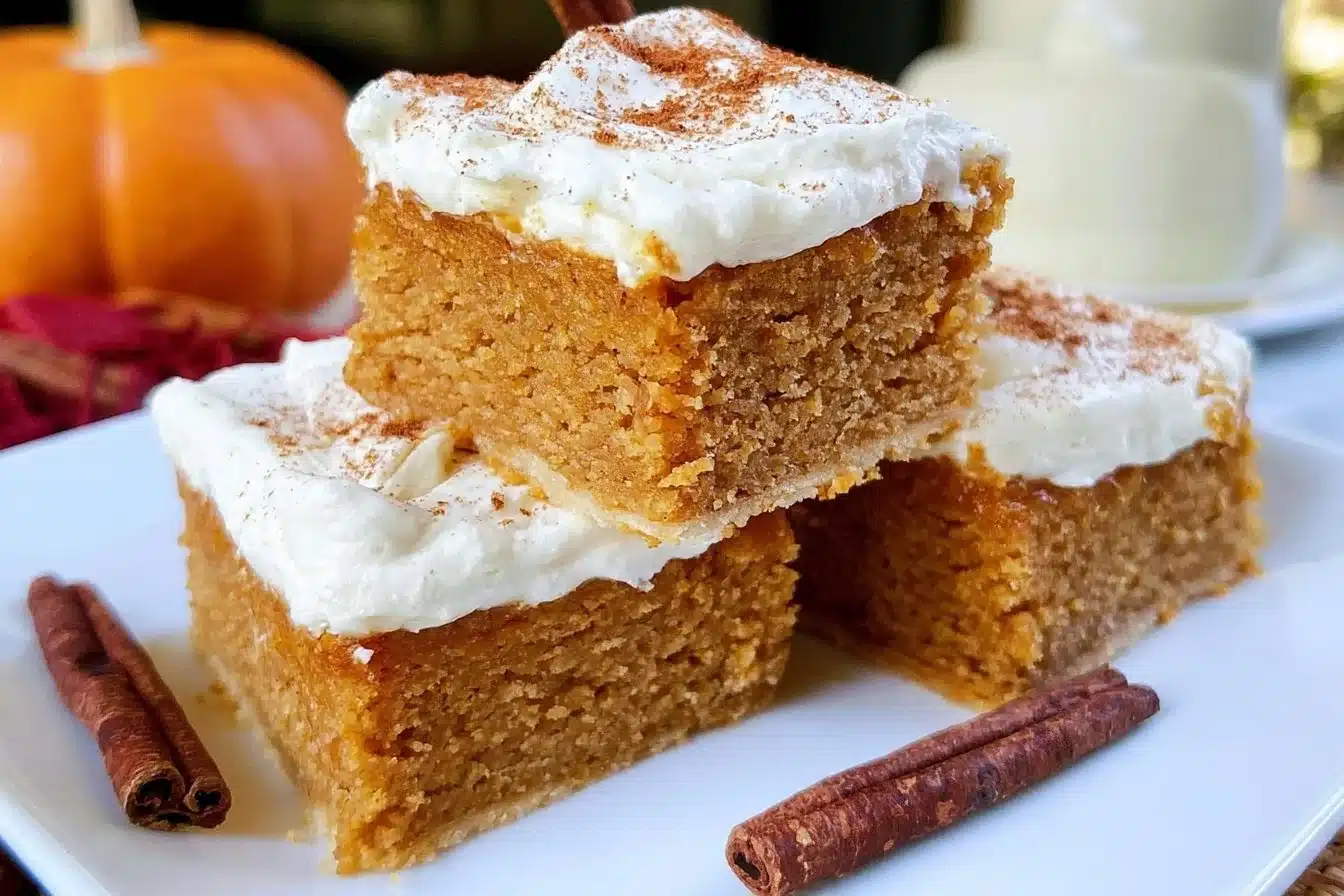 Delicious gluten-free pumpkin squares decorated with a sprinkle of cinnamon
