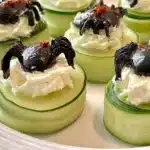 Halloween Keto Cucumber Spider Bites decoration on a platter