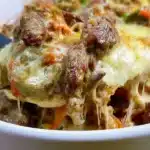 Keto Philly Cheese Steak Casserole with melted cheese and steak slices