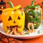 Gluten-free Jack-o'-Lantern Stuffed Peppers for Halloween dinner