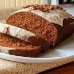 Gluten-free gingerbread loaf freshly baked and sliced.