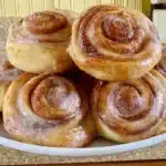 Delicious gluten-free cinnamon rolls topped with creamy icing