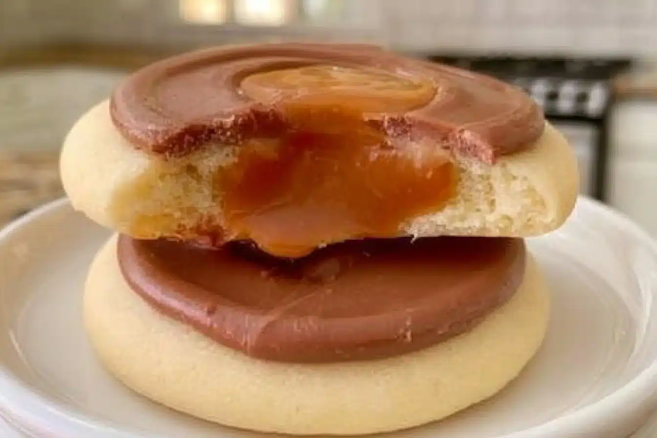 Delicious Twix cookies with a soft sugar cookie base topped with caramel and chocolate
